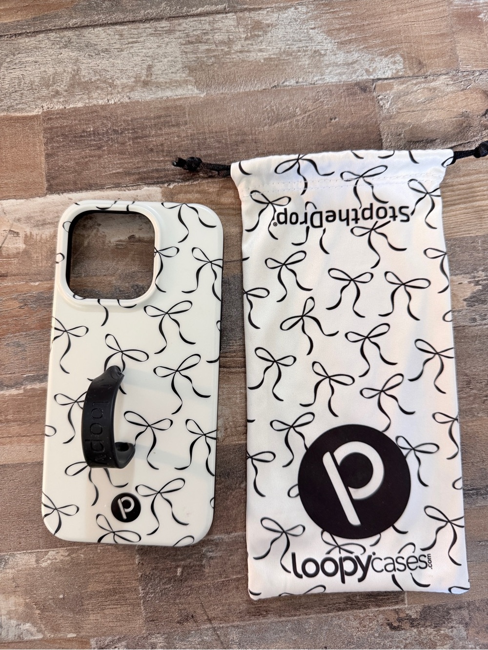 Loopy Iphone 15 pro Case with Black Bows